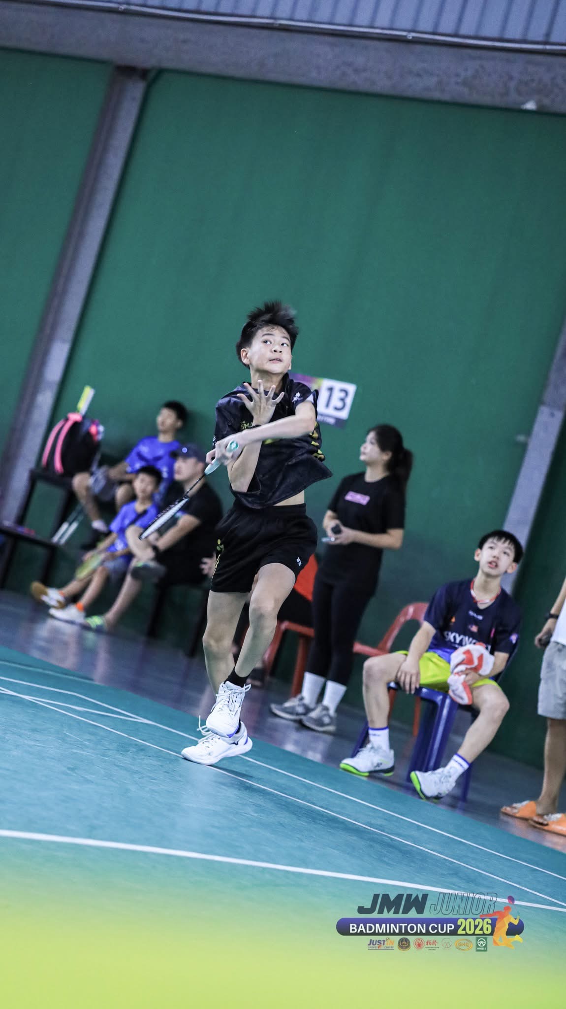 KSA advanced player executing a forehand at the JMW Junior Badminton Cup 2026